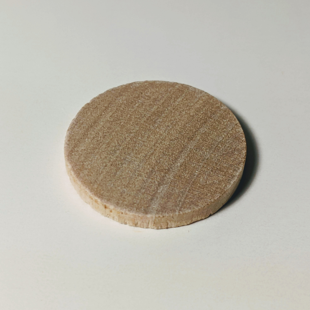 One inch wooden token for testing coloring tools